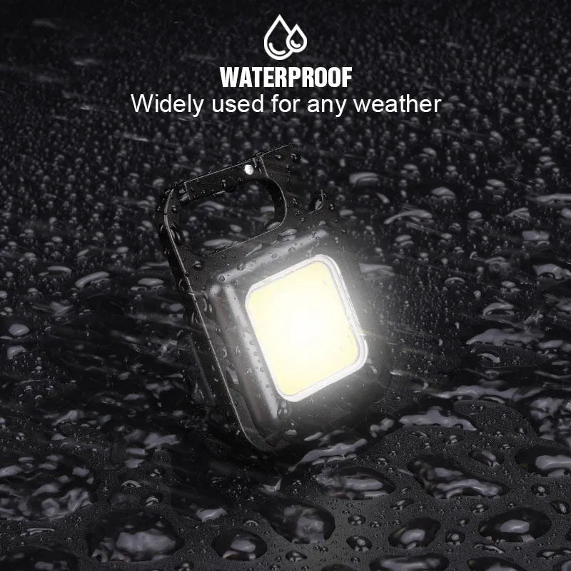 Black aluminium alloy USB keychain light with magnetic base and foldable handle