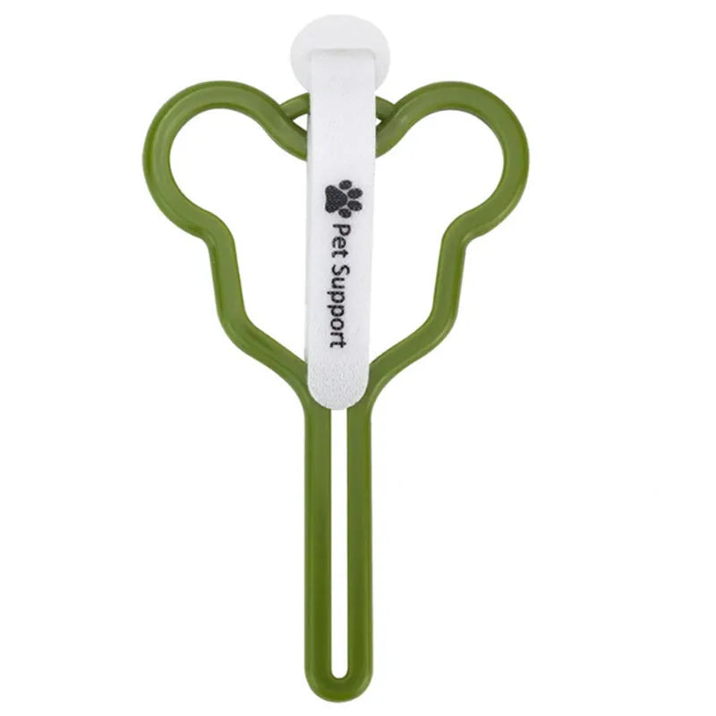A dog poop bag holder with a Velcro strap, shown attached to a pet leash.