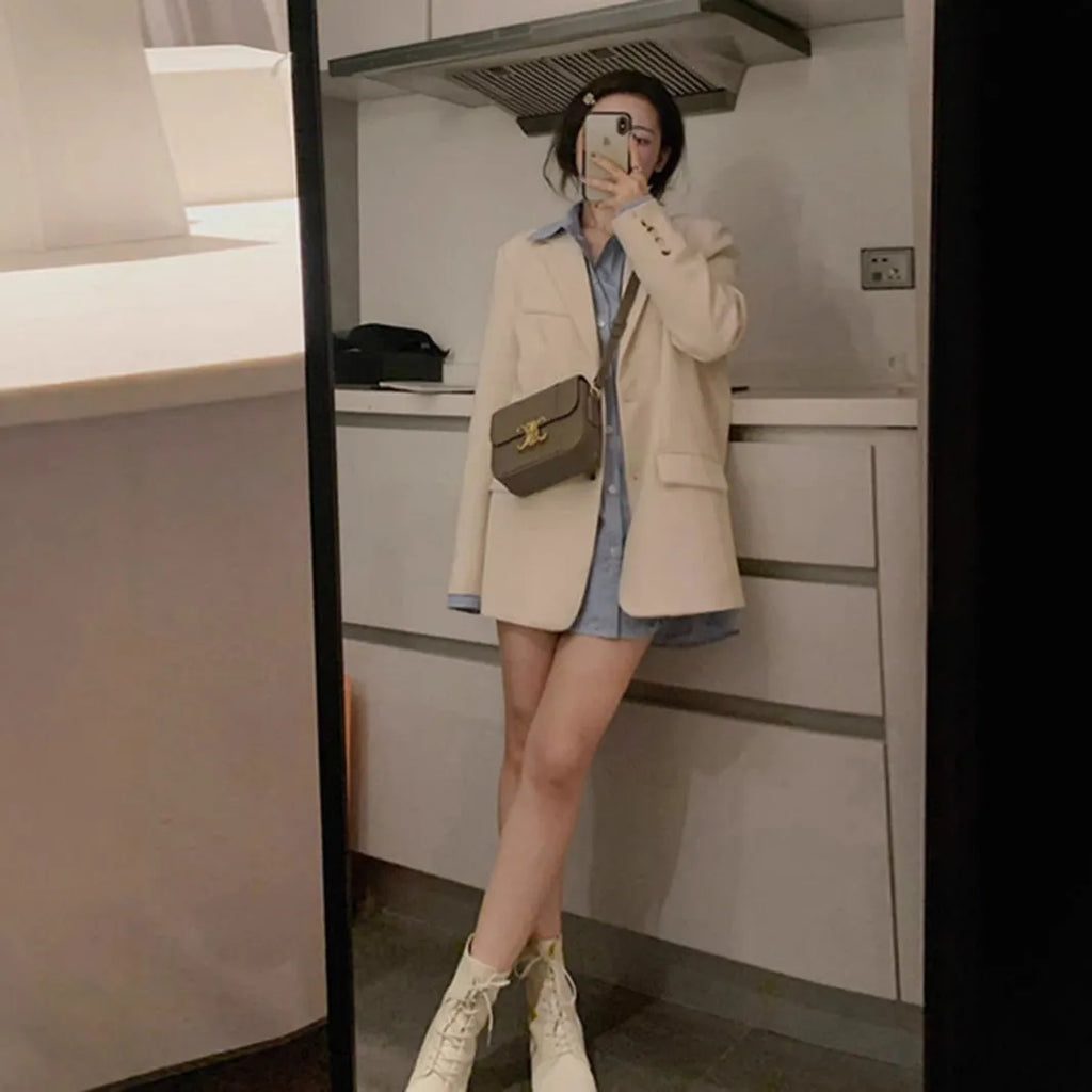 Women's Korean style small suit jacket in polyester fabric with pocket detail and long sleeves