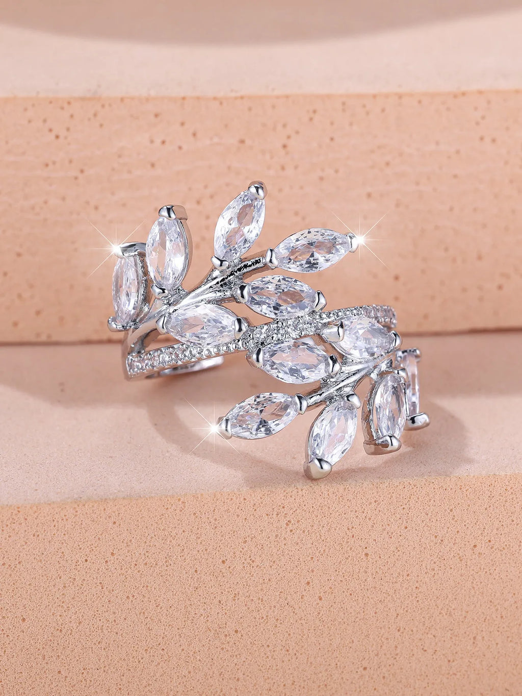 Adjustable copper leaf ring with zircon accents in multiple colour finishes including platinum white and rose gold