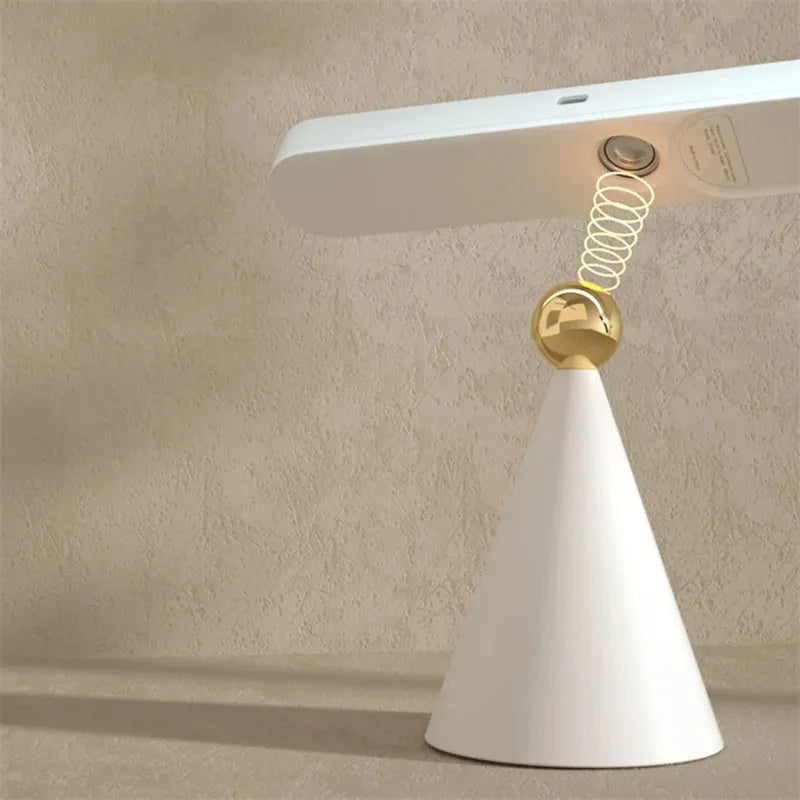 Geometric USB desk lamp with magnetic suction base for wall mounting in white colour