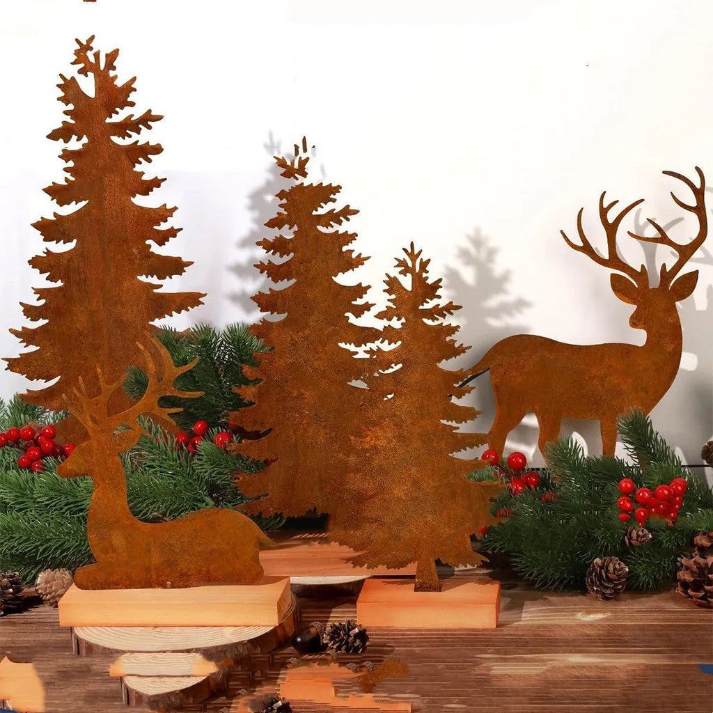 Three rustic metal Christmas tree ornaments shaped like elk with an oxidised iron finish.