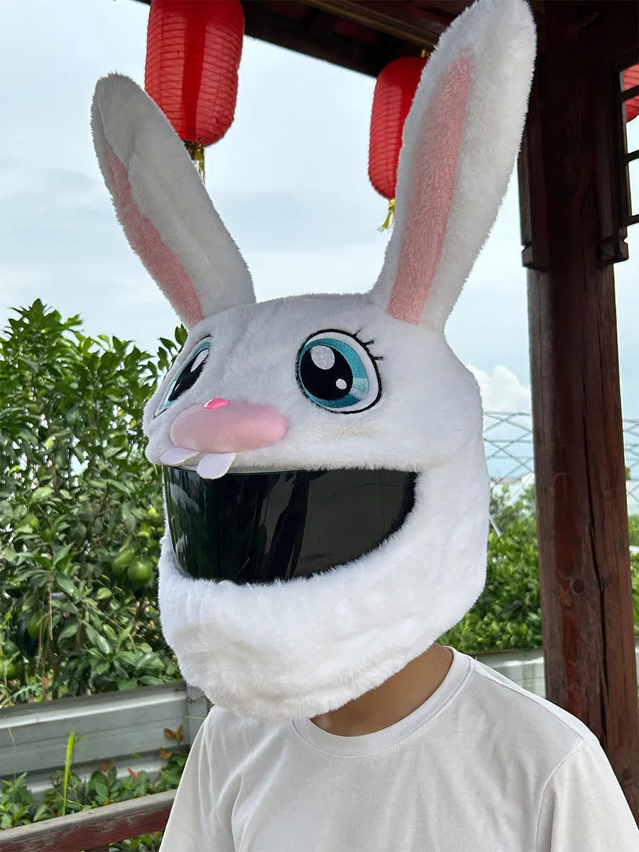 White plush rabbit head decorative cover for an electric motorcycle helmet.