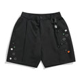 Men's black loose-fit semi-elastic casual shorts with button and zip fly, shown above the knee.