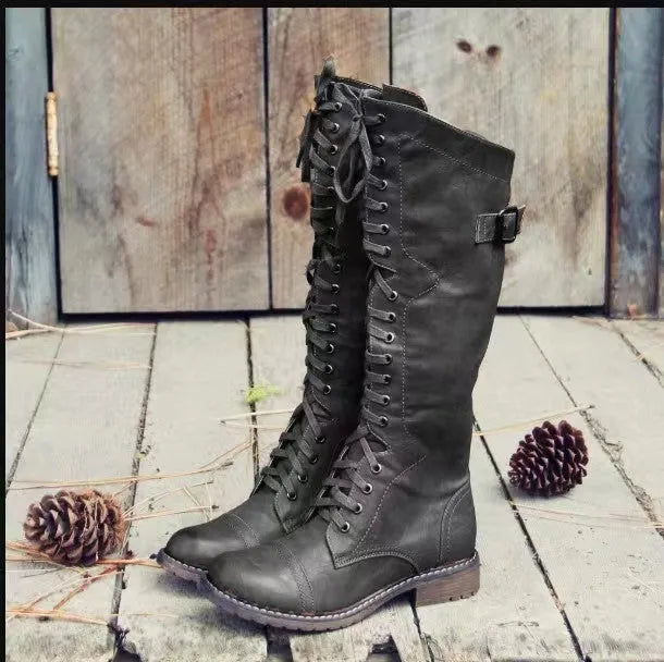 Women's black high leg chunky heel casual boots on a white background
