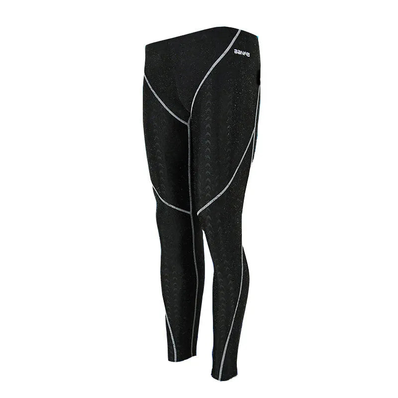 Men's black nylon cropped swimming trunks with a line detail, briefs style for swimming and sports.