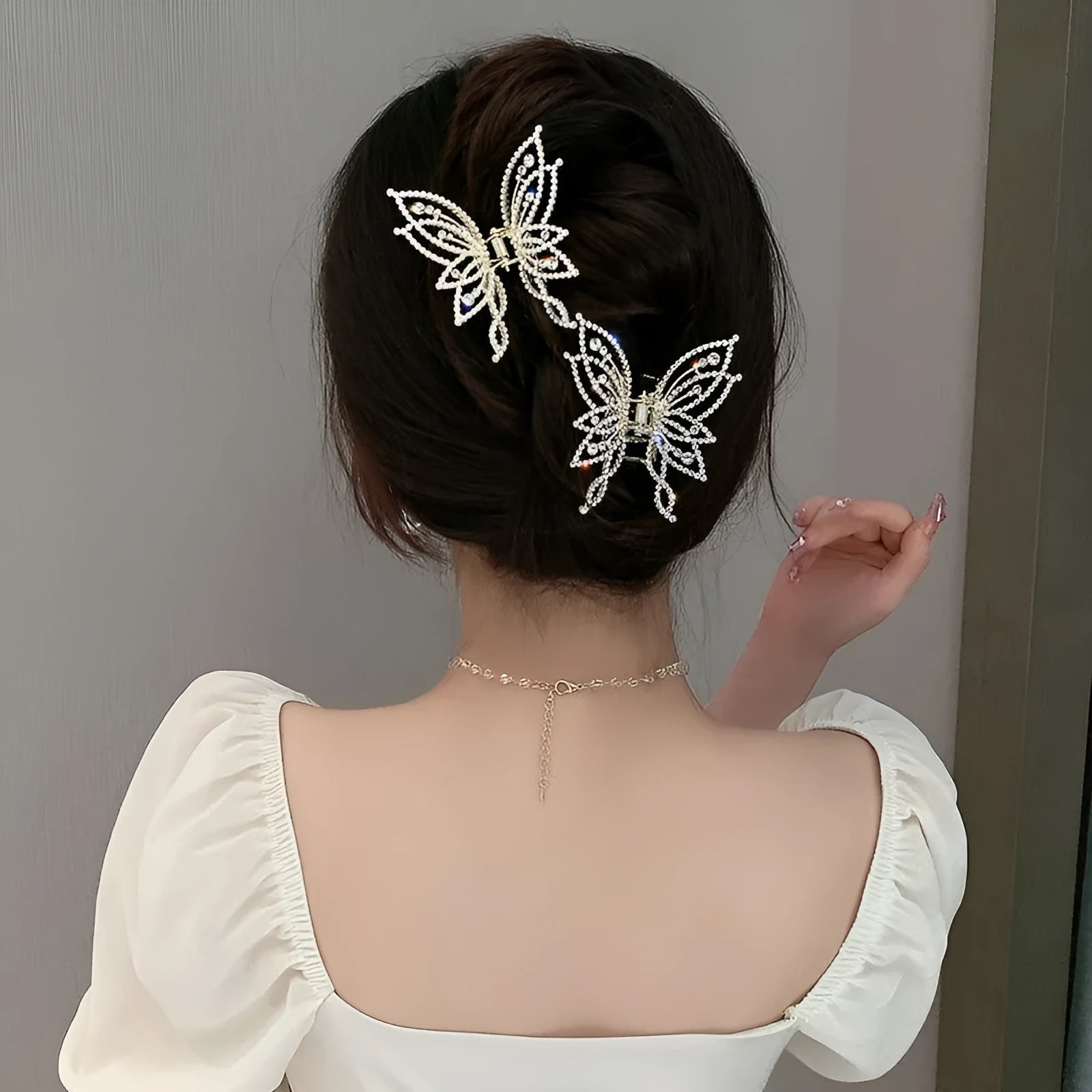 Butterfly hair barrettes for women in alloy with rhinestone or pearl decoration