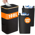 Black bamboo laundry basket with removable lid, ventilation holes, and two inner pockets.