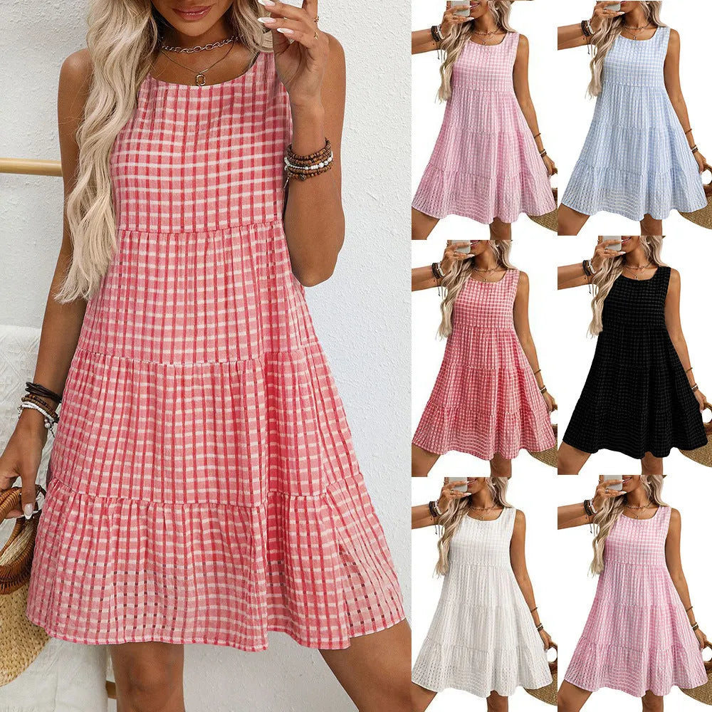 Women's light blue sleeveless plaid dress with an oversized swing skirt and high waist on a mannequin.