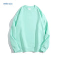 Women's loose fit off-the-shoulder cotton sweater in a solid colour, showing round neck and long sleeves.