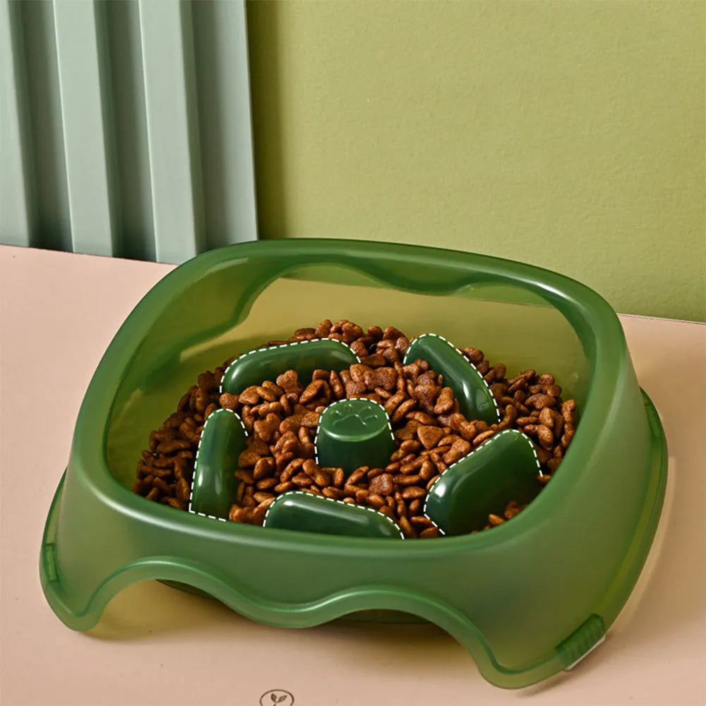Blue plastic dog slow feeder bowl with anti-choking design on a white background