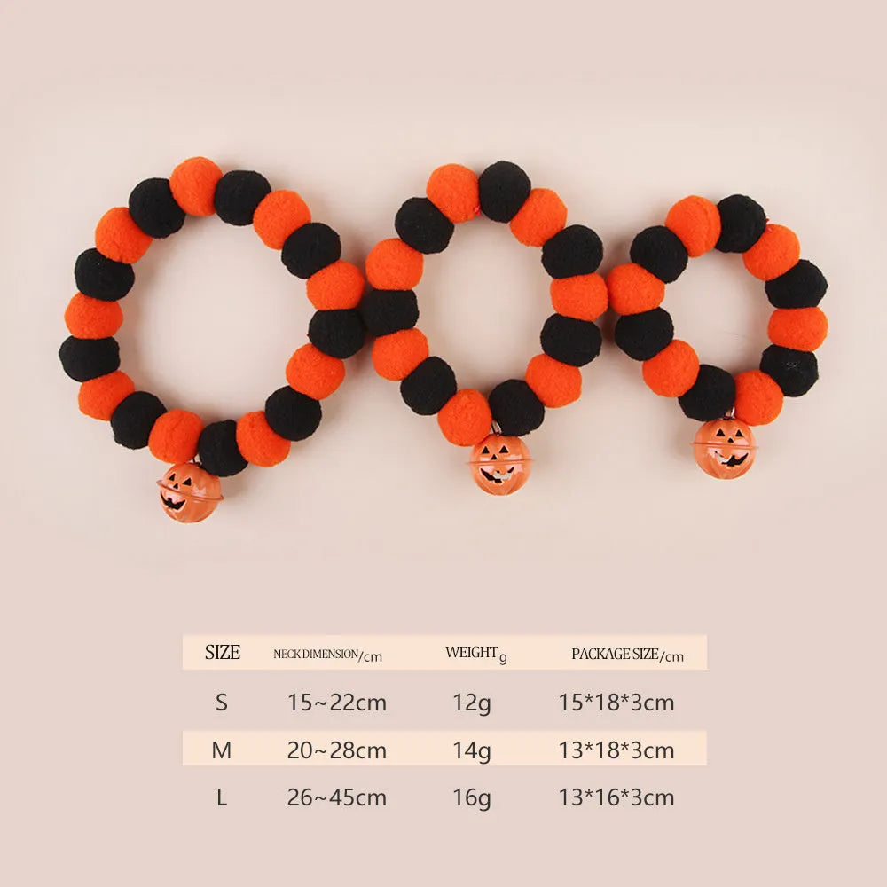 Orange and black pumpkin-shaped adjustable cat collar for Halloween.