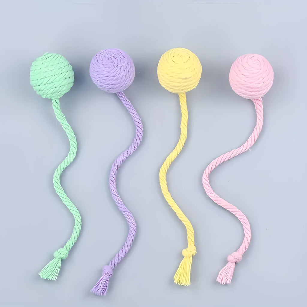 Colourful cat toy ball with rope attachment and built-in bell for interactive play