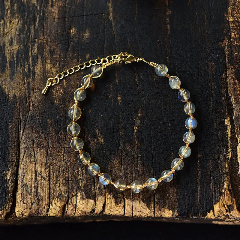 Women's moonstone crystal bracelet with 14K gold gilded metal and starry sky colour design