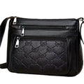 Butterfly Black PU shoulder messenger bag with embossed detail and horizontal square shape