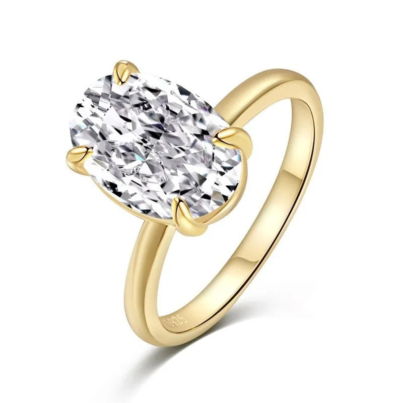 Oval women's ring with four-claw setting and oval gemstone in gold or silver finish