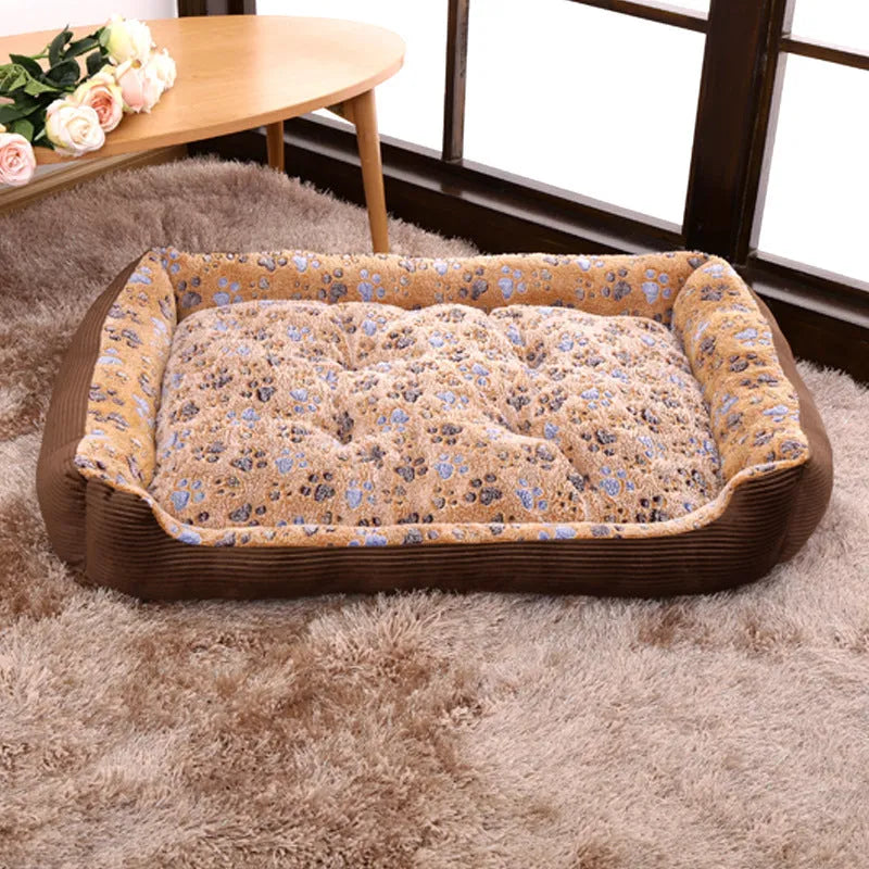 Beige plush dog bed with high bolsters and a removable washable cover for small pets.