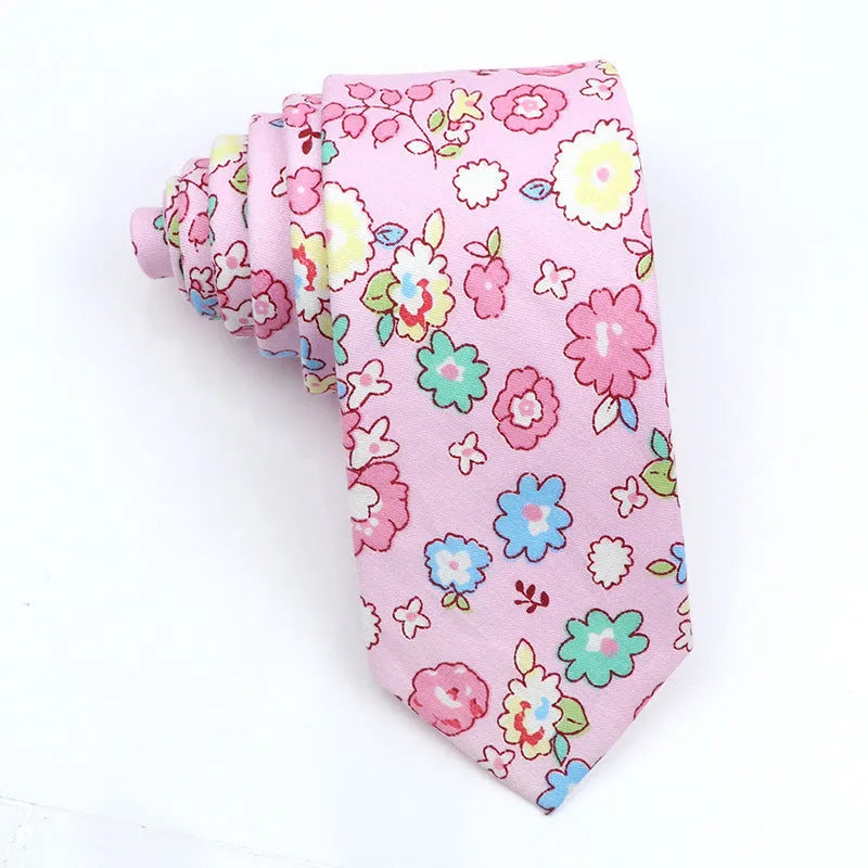 Narrow Korean-style cotton bow tie featuring a colourful cartoon print pattern.