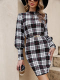 Black women's tight dress with lantern sleeves and leather stitching details