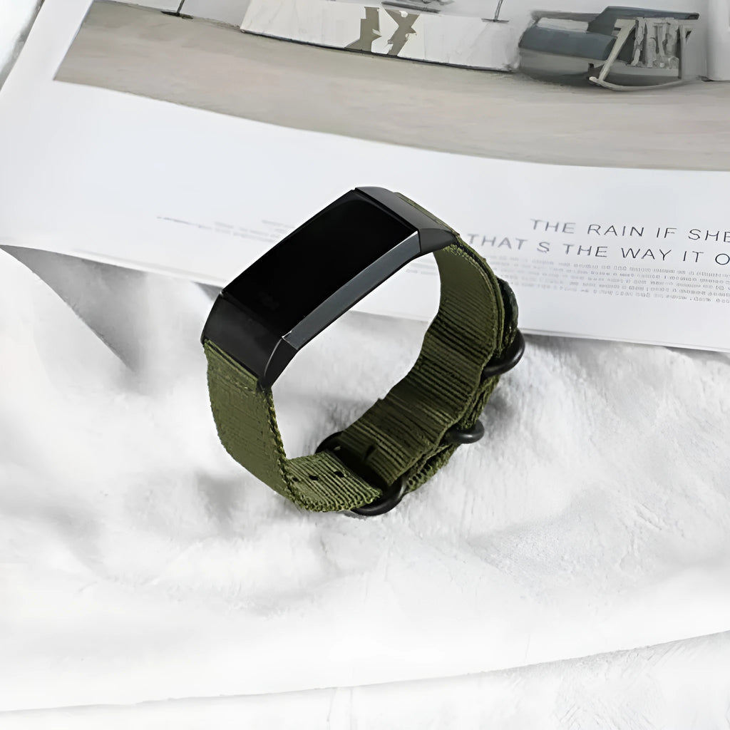 Fitbit Charge nylon replacement watch strap with a three-ring metal buckle shown in Army Green colour.