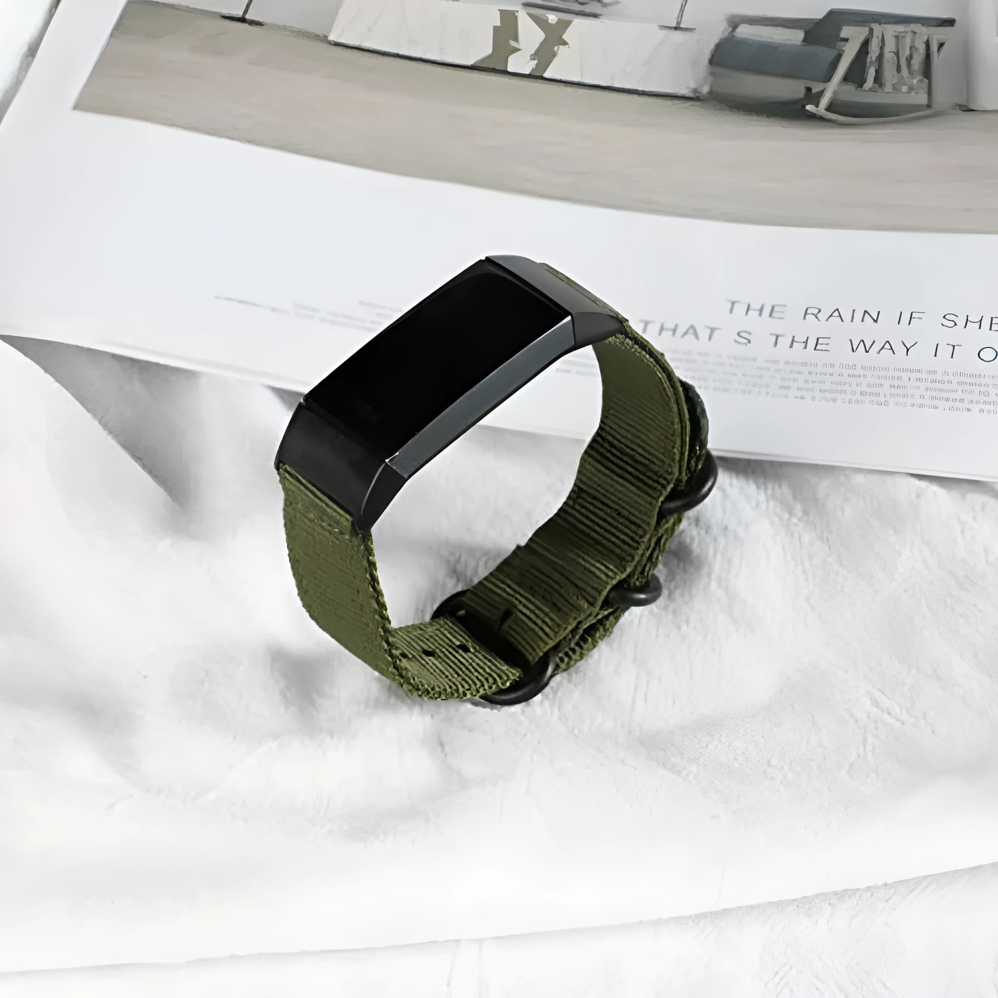 Fitbit Charge nylon replacement watch strap with a three-ring metal buckle shown in Army Green colour.