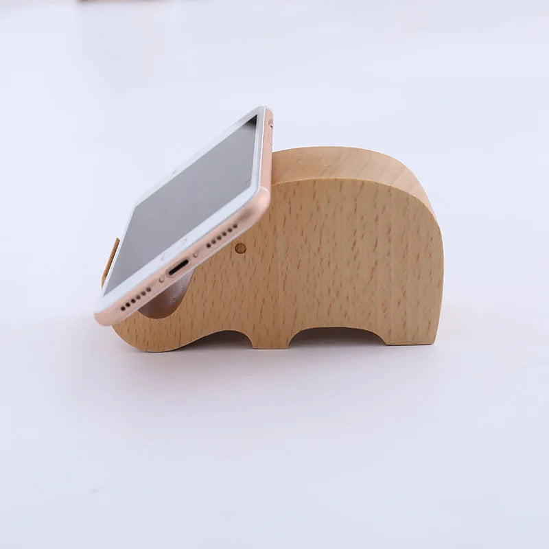 Beech wood mobile phone holder with resin animal decoration and custom lettering on coin back.