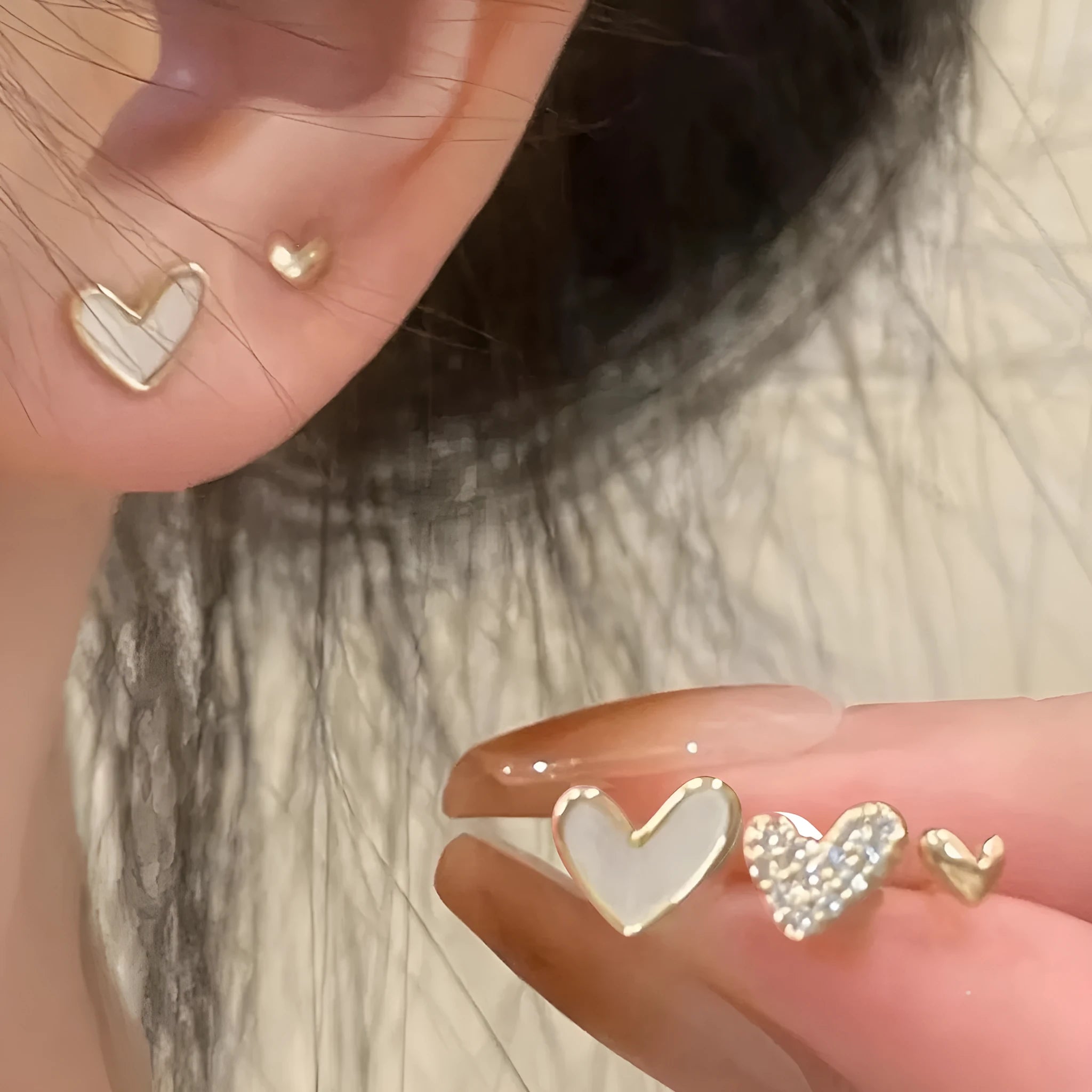 Women's fashion heart earrings set with 3 pairs in gold, black, and pink alloy electroplated colours