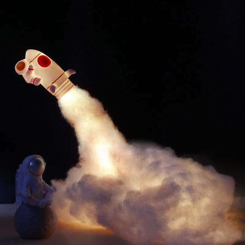 DIY astronaut rocket night light kit with warm LED string lights and assembly materials