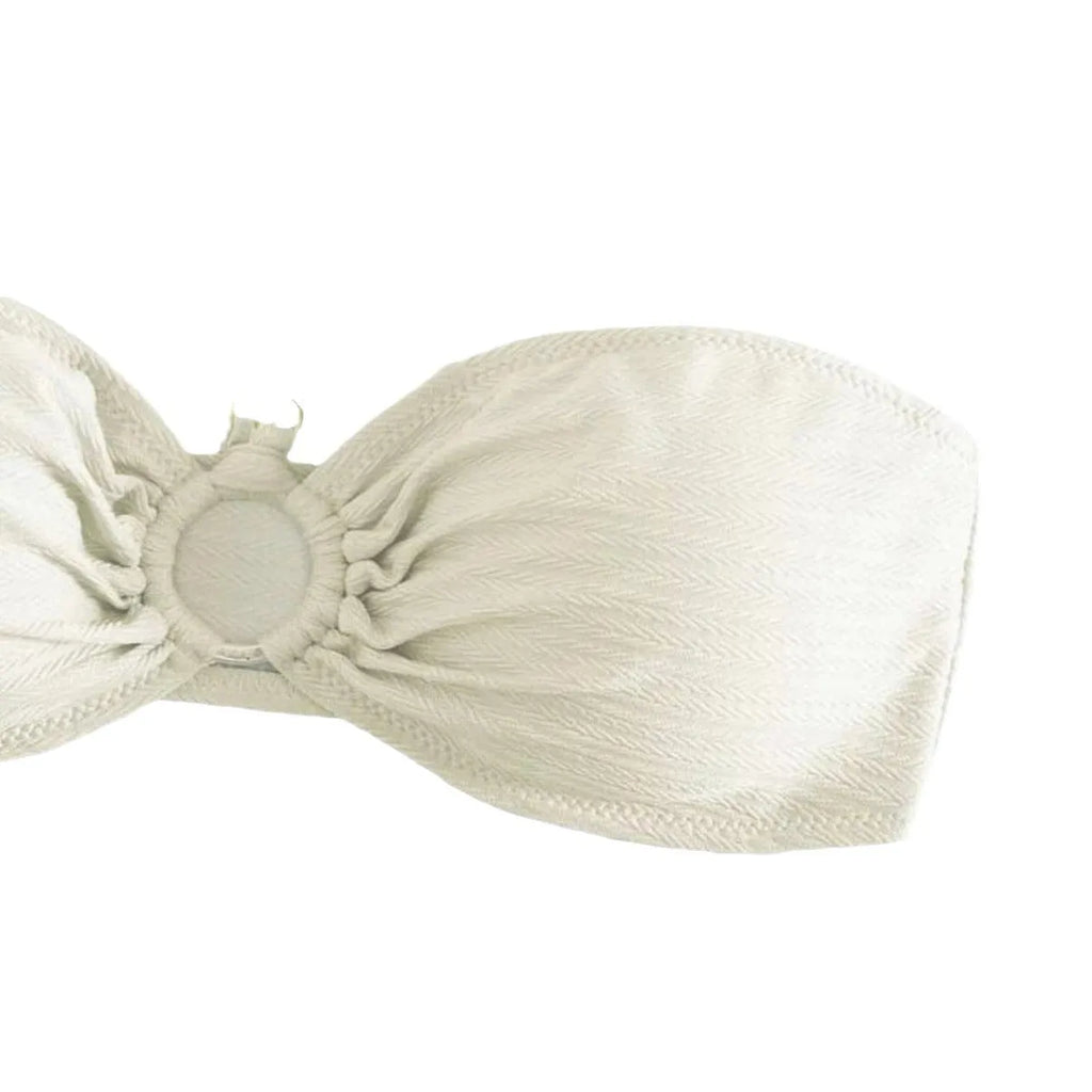 Women's halter-style bikini set in solid colour on a white background.