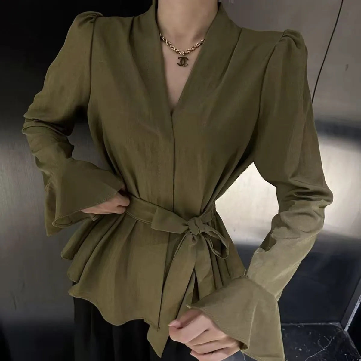 Women's French-style irregular collar long sleeve tied shirt with bell sleeves in polyester fabric
