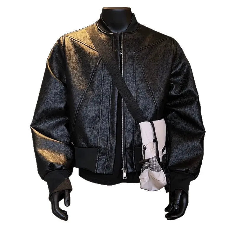 Men's black PU leather jacket with litchi grain texture, showing extended length and tight fit.