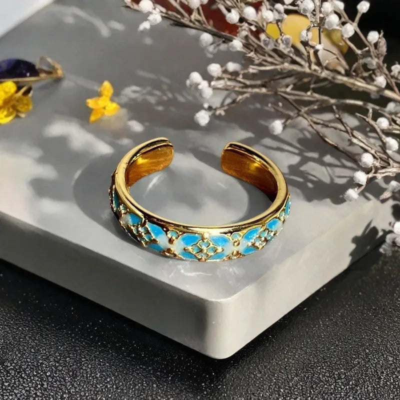 Adjustable copper gourd ring with inlaid zircon stones in a vintage oil dripping finish.