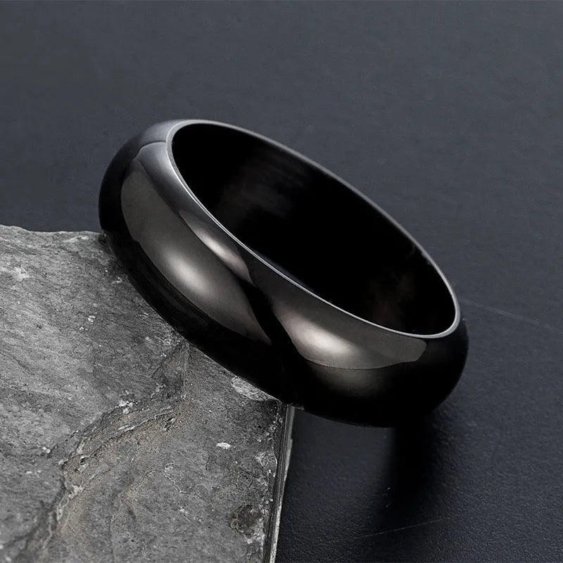 Glossy electroplated titanium steel ring in gold, black, or steel colour showing band detail