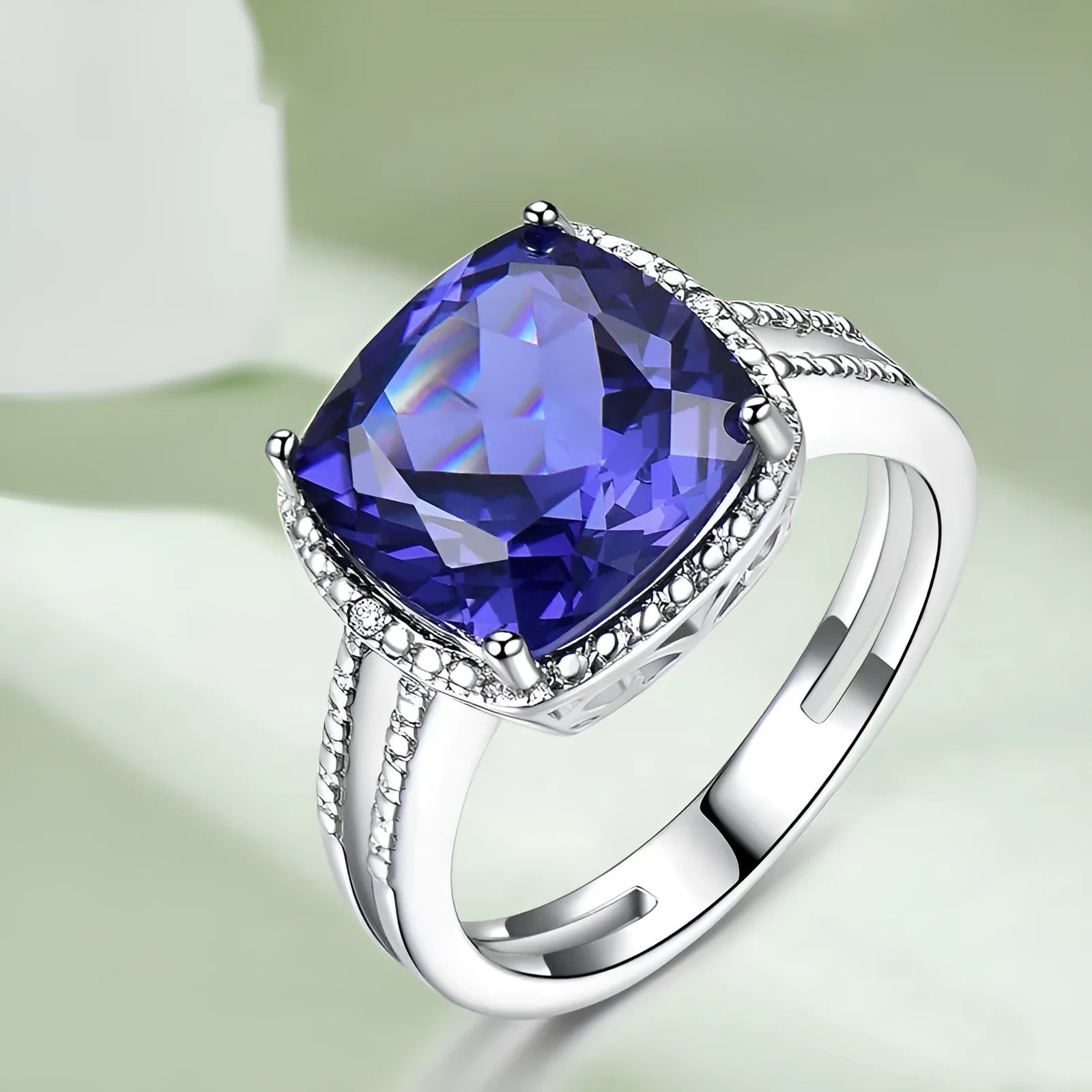Close-up of a blue Tanzanite stone set in a polished 925 Sterling Silver women's ring.