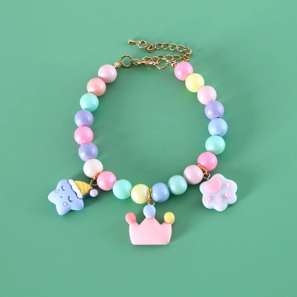 Macaron-coloured pet accessory set with resin headdress, collar, necklace and bracelet for photography