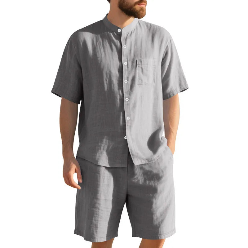 Men's linen two-piece summer suit with Henry collar jacket and matching shorts in light blue colour