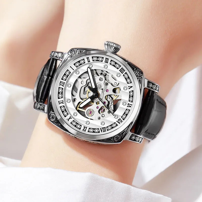 Mechanical wristwatch with luminous dial on leather strap, available in multiple colours including black, red and white