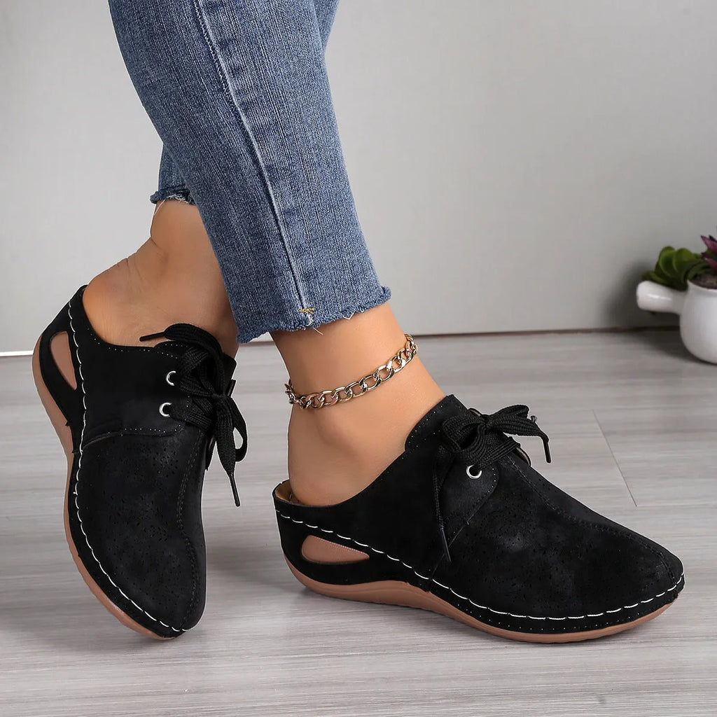 Women's summer baotou lace-up slippers with hollow-out wedge sole in a light grey colour.