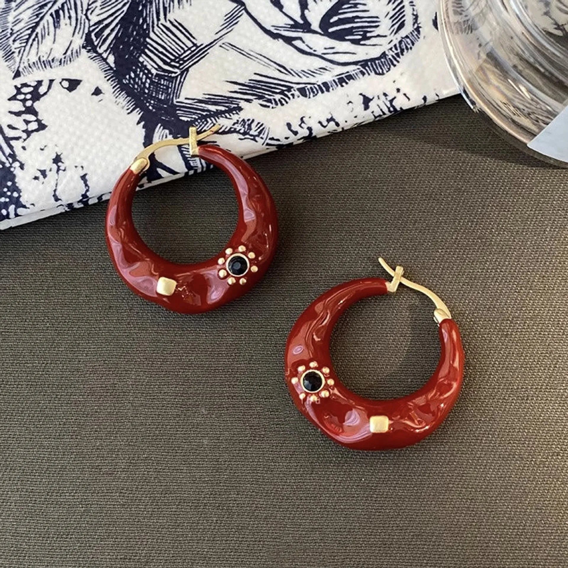 Hong Kong style black and red alloy ear studs with rhinestone decoration and dripping oil treatment