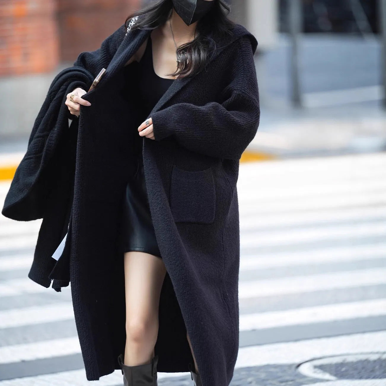 Long grey knitted hooded cardigan trench coat with loose fit and regular sleeves