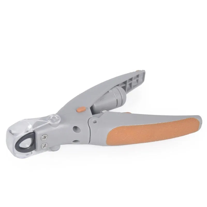 LED dog nail clipper with illuminated tip and visual blood line guide on a white background.