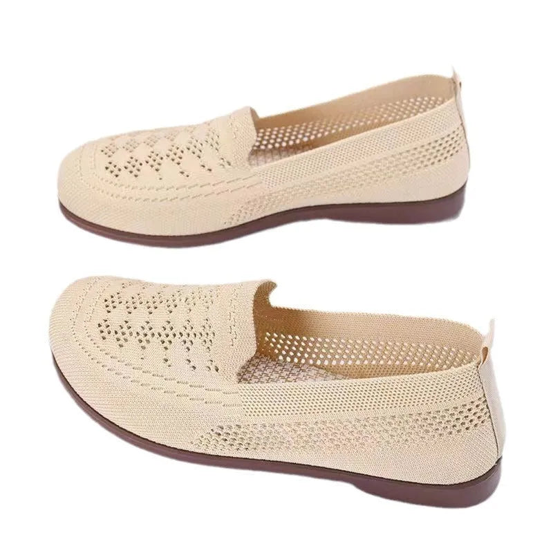 Women's beige low-top mesh tennis shoes with a round toe and anti-skid PVC sole, shown on a neutral background.