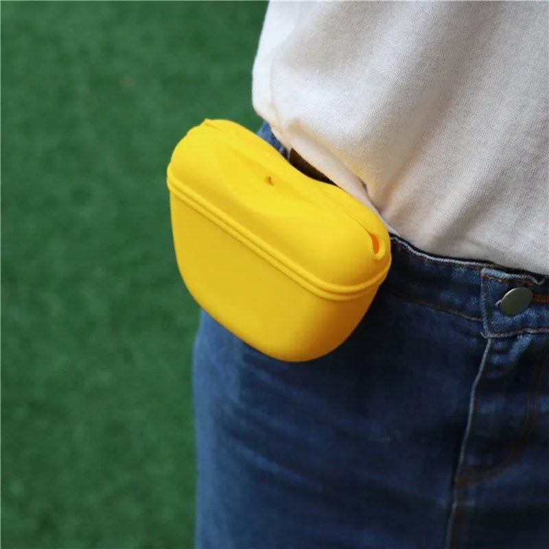 Silicone dog treat bag with clip attachment showing magnet closure and food-grade construction