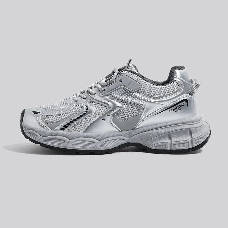 Gray low-top casual platform sneakers with leather stitching on a mesh upper and a light EVA sole.