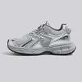 Gray low-top casual platform sneakers with leather stitching on a mesh upper and a light EVA sole.