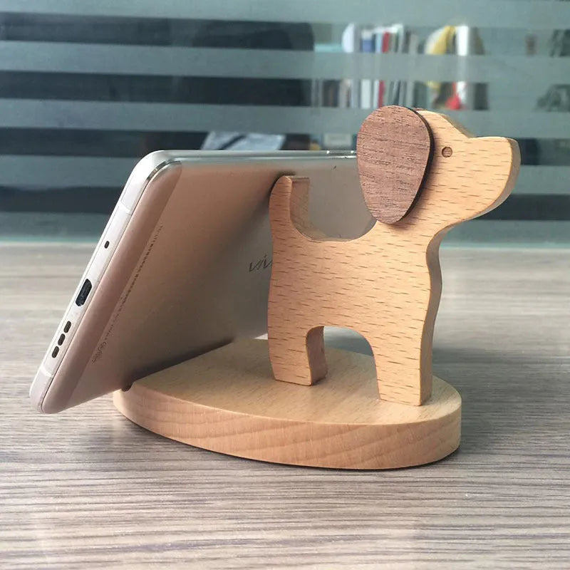 Beech wood mobile phone holder with resin animal decoration and custom lettering on coin back.