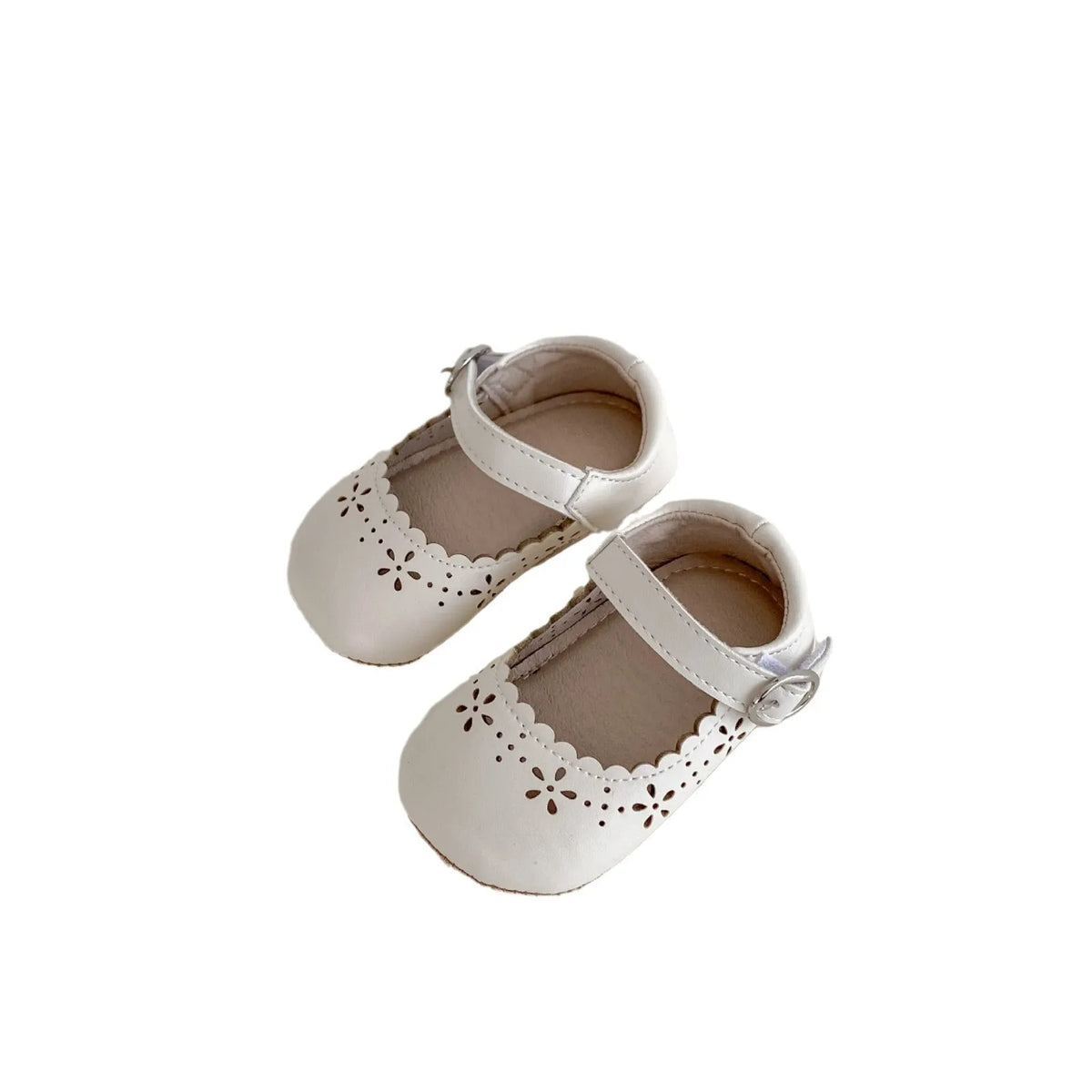 Solid colour hollow breathable soft sole shoes with rubber sole and artificial PU upper, shown in red.