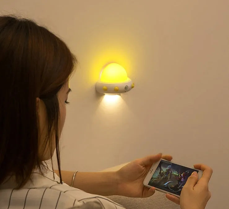 Remote control UFO bedside night light in blue colour with cartoon design