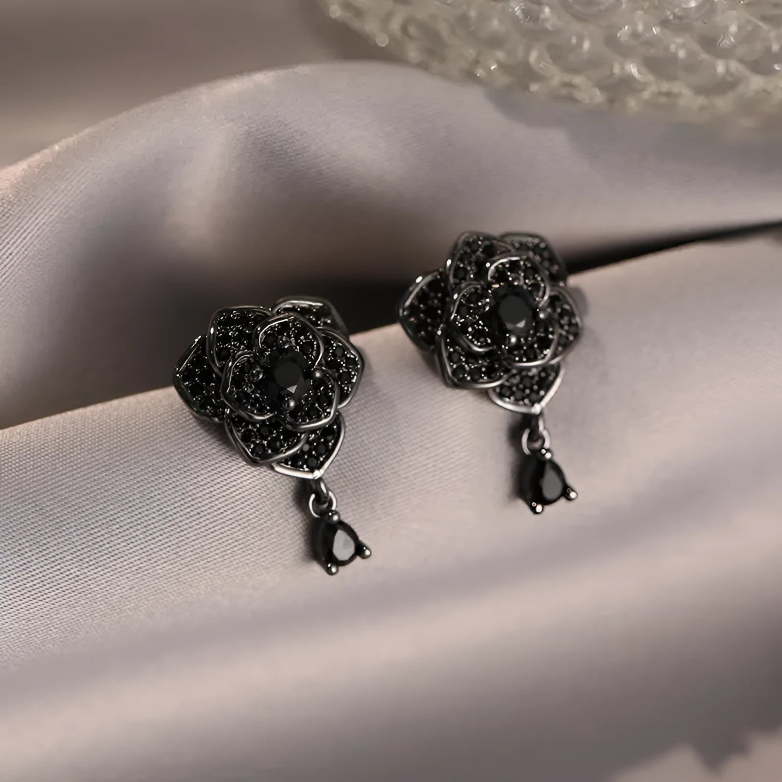 Black rose zircon stud earrings with flower shaped design on copper base