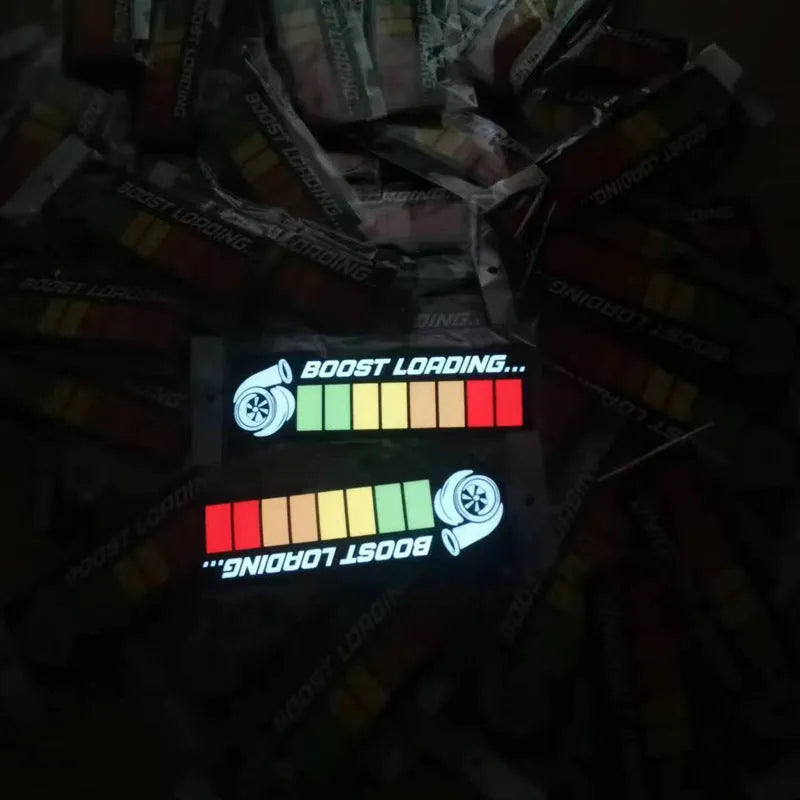 Electroluminescent car window sticker kit with driver and cable, showing foundation white glow.